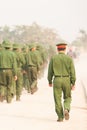 Rear view, a group of Young Vietnamese soldier walking on the street during site visit program of Vietnamese military academies.