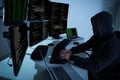 Hacker Using Computers To Steal Data Royalty Free Stock Photo