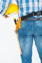 Rear view of handyman wearing tool belt