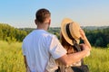 Rear view, happy middle aged couple looking at the horizon on summer nature Royalty Free Stock Photo