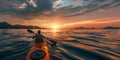 Rear view of kayaker man paddle kayak at sunset sea. Kayaking, canoeing, paddling. empty space panoramic Royalty Free Stock Photo