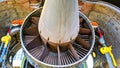 Rear view of a large aircraft engine during installation in the hangar. Common nozzle assembly Royalty Free Stock Photo