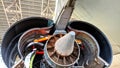 Rear view of a large aircraft engine during installation in the hangar. Common nozzle assembly Royalty Free Stock Photo