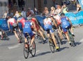 Rear view of large group of male cycling triathlon competitors Royalty Free Stock Photo