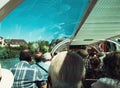 Rear view of large group of passengers tourists. sightseeing through the large