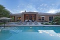 Rear view of luxury villa with swimming pool Royalty Free Stock Photo