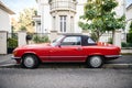 Rear view of luxury vintage red convertible Mercedes SL 300