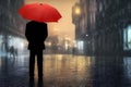 Rear view of man in black coat with umbrella walking in rain on city street in evening.