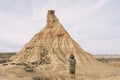 Rear View Of A Man With A Hat Taking A Photo With A Smart Phone In The Bardenas Desert. Navarre Royalty Free Stock Photo