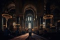 Rear view of a man praying in a Muslim mosque. Huge Arabian architecture with beautiful ceiling rose light. Muslims are praying in