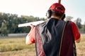 Rear view on Man shooting at target on an outdoor shooting range Royalty Free Stock Photo