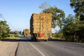 A rear view of the many bales of straw, harvested from the rice fields and packed on a truck Royalty Free Stock Photo