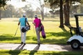 Rear view of mature golfer couple Royalty Free Stock Photo