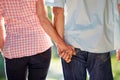 Rear View Of Middle Aged Couple Walking Along Country Lane Royalty Free Stock Photo