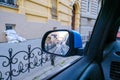 Rear-view mirror in a car with a view of the city of Lviv Royalty Free Stock Photo