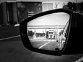 Rear view mirror reflection truck filling gas