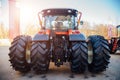 Rear view of modern agricultural tractor. Hydraulic hitch. Hydraulic lifting frame.