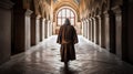 Rear view of a monk walking through a corridor in a church. Generative AI