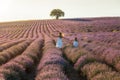 Mother and daughter in a lavender field