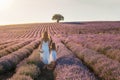 Mother and daughter in a lavender field