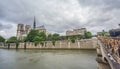 Rear view of Notre Dame, Seine river and bridge Royalty Free Stock Photo