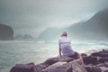 Rear view of old man enjoying Papuma beach view Royalty Free Stock Photo