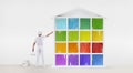 Rear view of painter man pointing with finger the colors house m Royalty Free Stock Photo