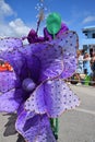 purple flower like costume during Carnaval Curacao 2023