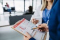 Rear view of pharmaceutical sales representative talking with doctor in medical building. Ambitious male sales Royalty Free Stock Photo