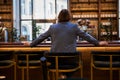 Relaxed gentleman waiting to be served at a hotel bar