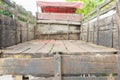 Rear view of a pick up truck made of wood. Perspective view.