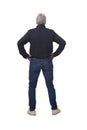 Rear view portrait of a man with two arms akimbo on white Royalty Free Stock Photo