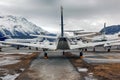 Rear view of private jets, planes and helicopters in the airport of StMoritz Engadin Switzerland in the alps Royalty Free Stock Photo