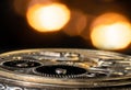 Rear view of retro pocket watch with clockwork. Vintage clock inside with gears, screws and gearing on black background Royalty Free Stock Photo