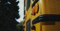 Rear view school bus yellow red headlights close up. Stop lights on schoolbus. Royalty Free Stock Photo