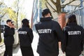 Security Guards Standing Outside Building Royalty Free Stock Photo