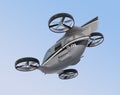 Rear view of self driving Passenger Drone flying in the sky