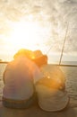 Rear view of senior couple fishing in pier Royalty Free Stock Photo