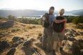 Rear View Of Senior Couple Standing At Top Of Hill On Hike Through Countryside In Lake District UK Royalty Free Stock Photo