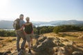 Rear View Of Senior Couple Standing At Top Of Hill On Hike Through Countryside In Lake District UK Royalty Free Stock Photo