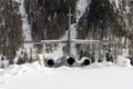 Rear view of a silver color private jet in the alps switzerland in winter Royalty Free Stock Photo