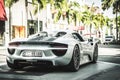 Rear view of a silver Porsche 918 Spyder