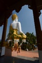 Rear view of the sitting Buddha statue. Wat Phra That Doi Kham temple. Amphoe Mueang. Chiang Mai province. Thailand