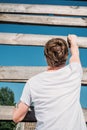 rear view of soldier climbing wooden barrier during obstacle run Royalty Free Stock Photo