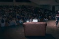 Rear view of speaker giving a talk on corporate Business Conference. Royalty Free Stock Photo