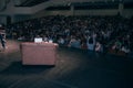 Rear view of speaker giving a talk on corporate Business Conference. Royalty Free Stock Photo