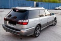 Rear View of Subaru Legacy Lancaster japanese car in beige color on the parking