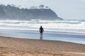 Rear View of Surfer Walking in an Australian Beach in Summer.Water Deport Concept Royalty Free Stock Photo