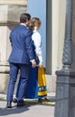 Rear view of the swedish prins Carl Philip Bernadotte and princess Sofia Hellqvist walking in to the royal castle