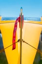 Rear view, tail rudder and red gust lock of small prop airplane.